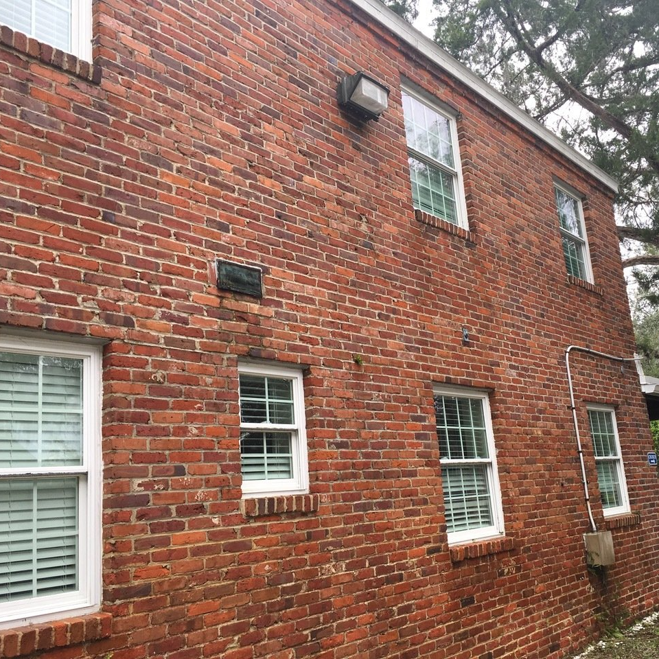 freshly low-pressure cleaned red brick house