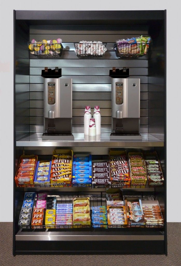A micro market shelf filled with snacks and coffee