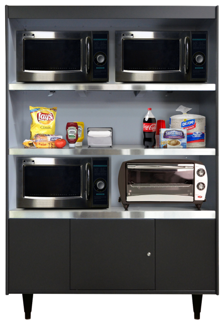 A shelf with two microwaves , a toaster oven , and a bag of lays chips on it.