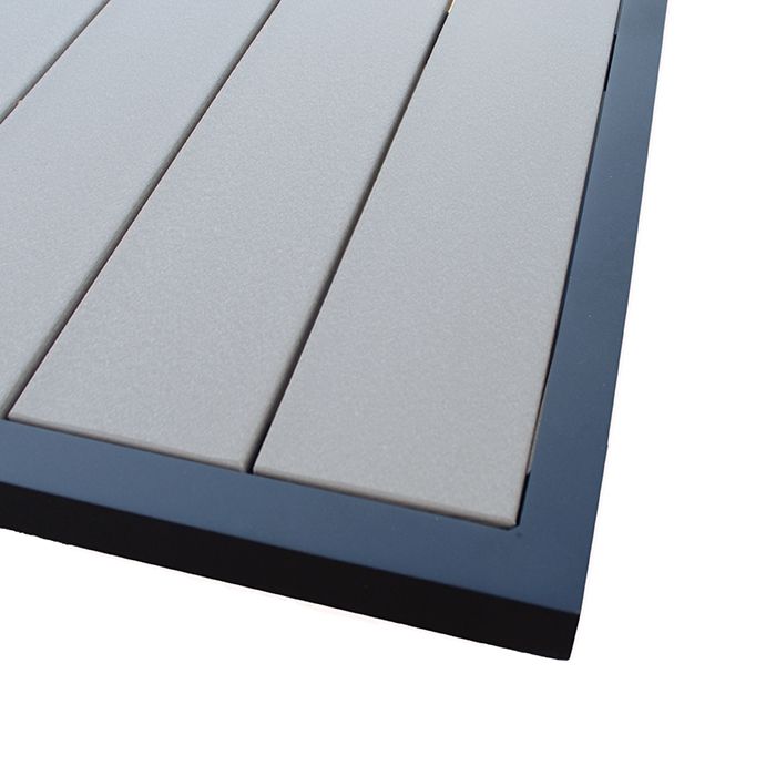 A close up of a wooden deck with a black frame
