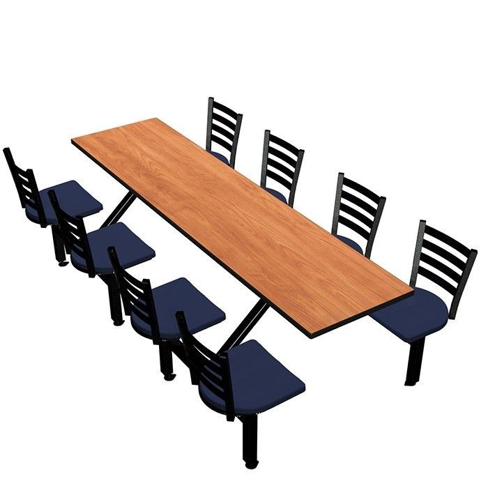 A long wooden table with black chairs around it