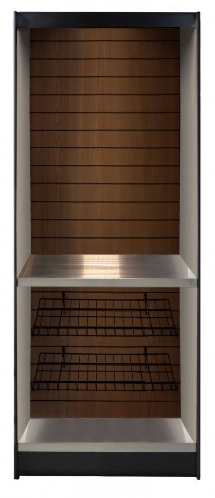 An empty micro market case with a wooden wall and a metal shelf.