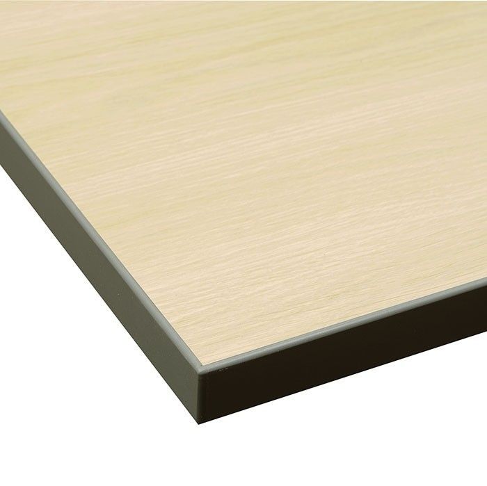 A close up of a piece of wood with a black border