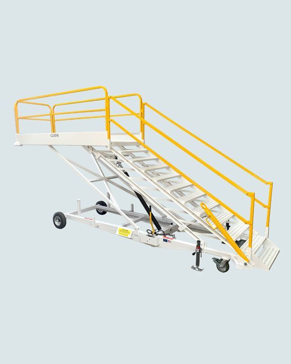 A white and yellow staircase with wheels and a yellow railing.