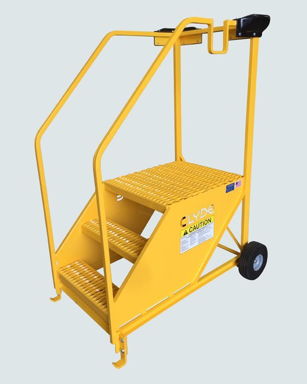 A yellow metal ladder with wheels and a handle