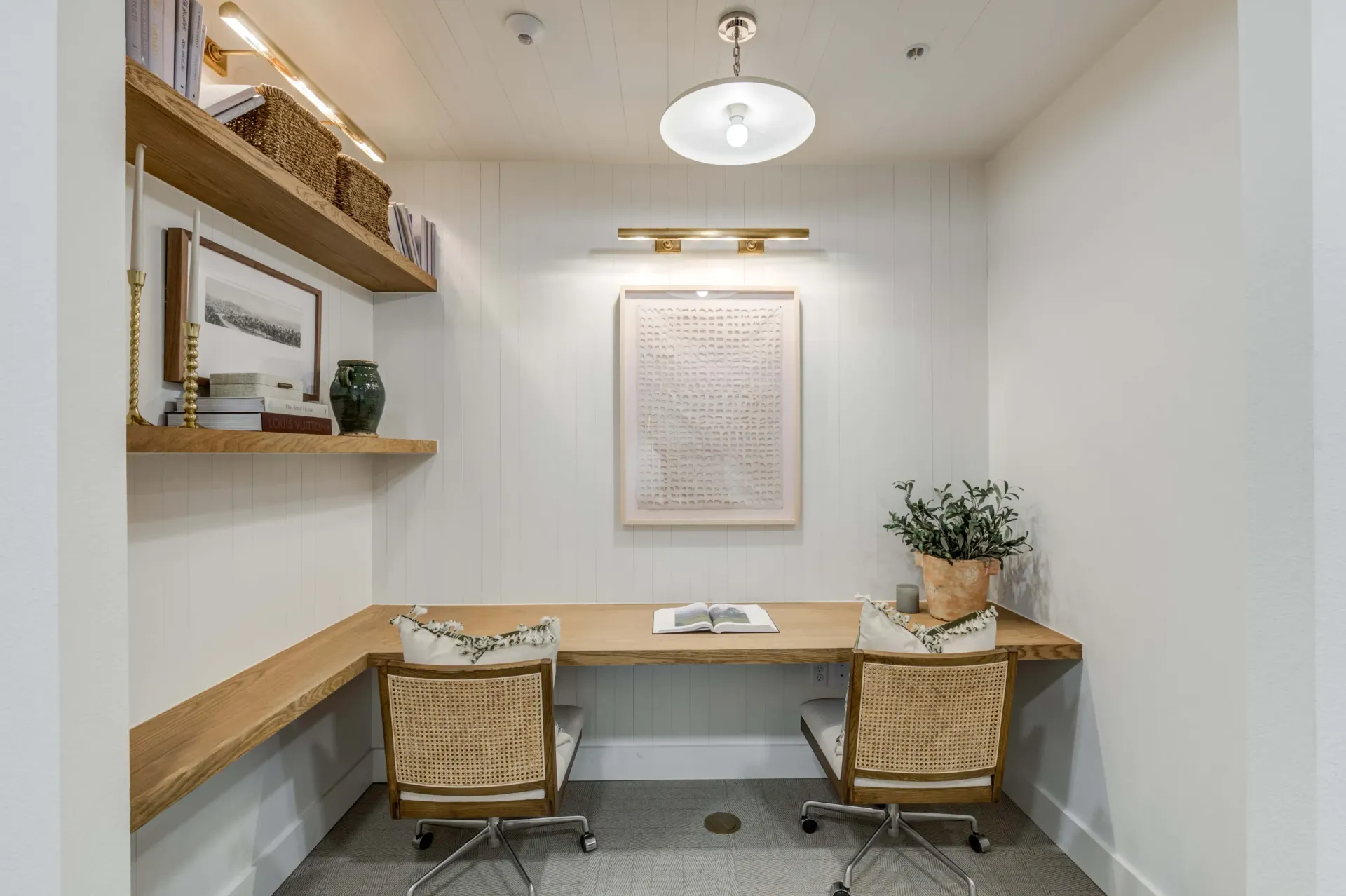 Two desks with chairs in a shared workspace at The Grayson apartments in Fort Worth, TX..
