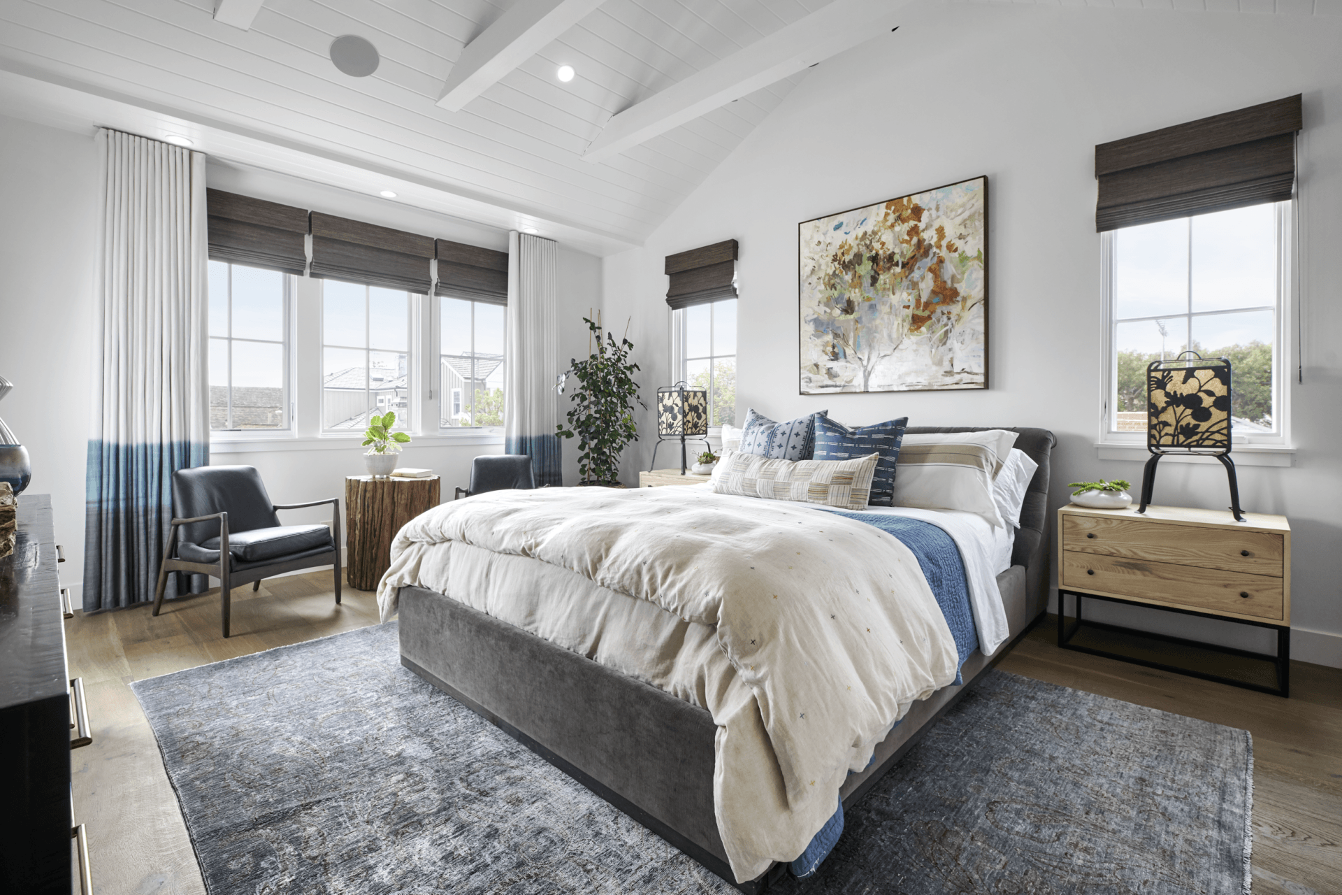 There is a large bed in the middle of the room.