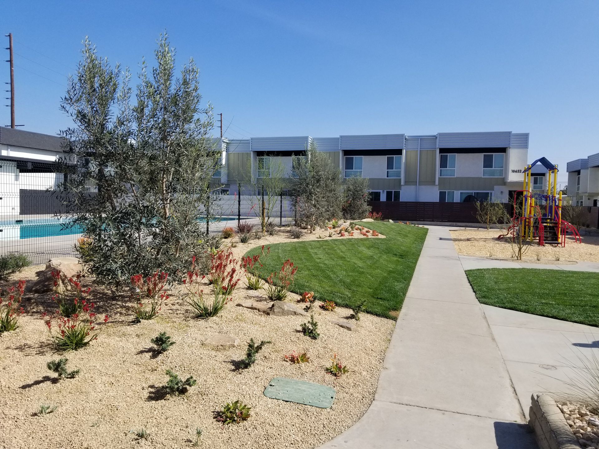 There is a playground in the middle of the park.