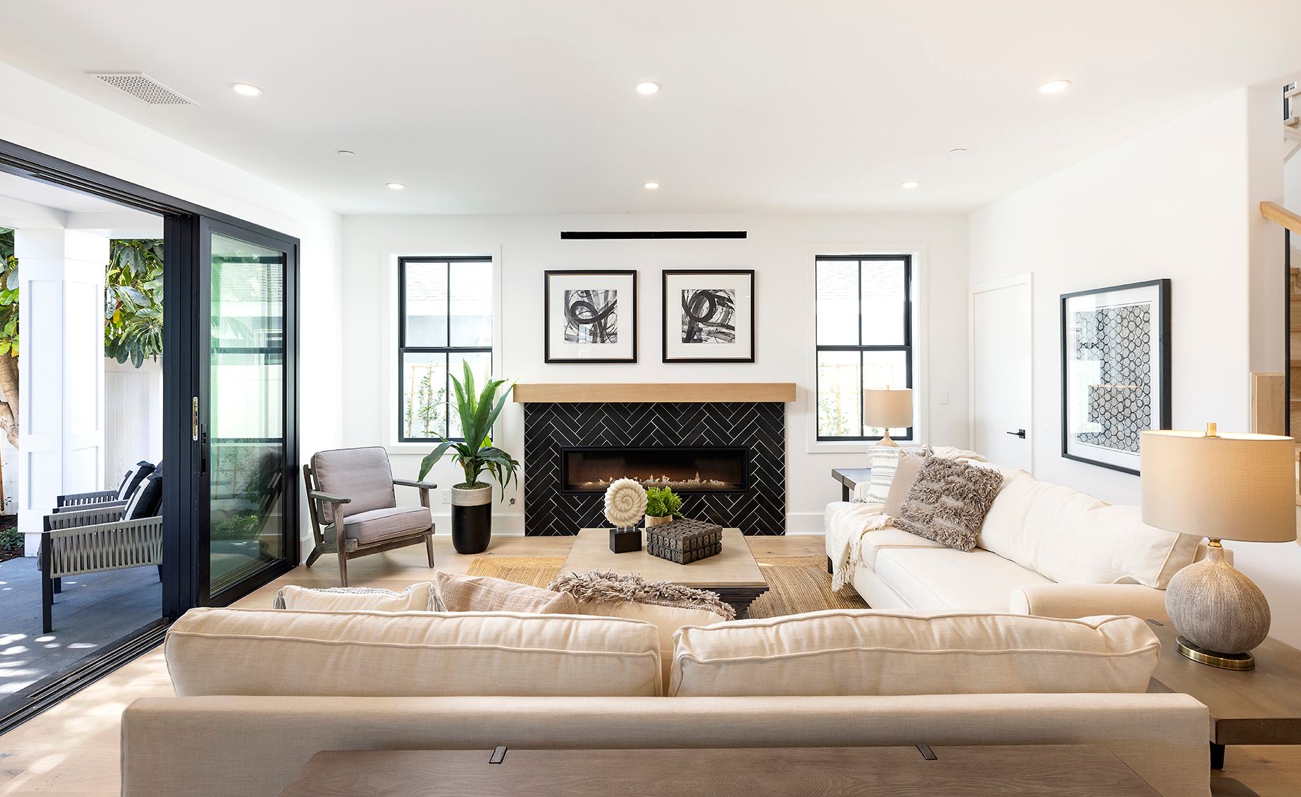 A living room filled with furniture and a fireplace.