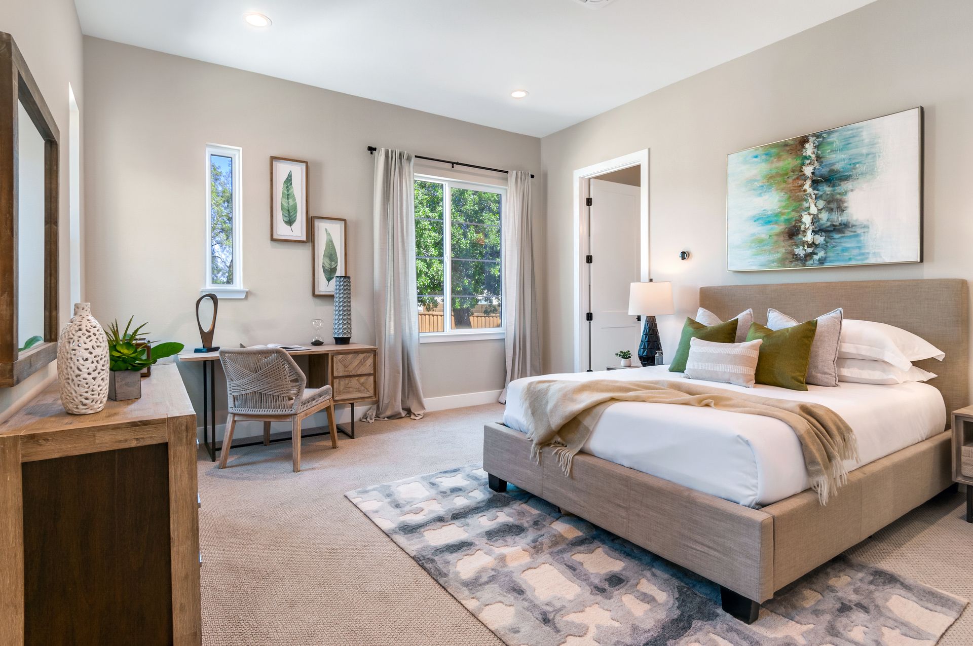 There is a large bed in the middle of the room.