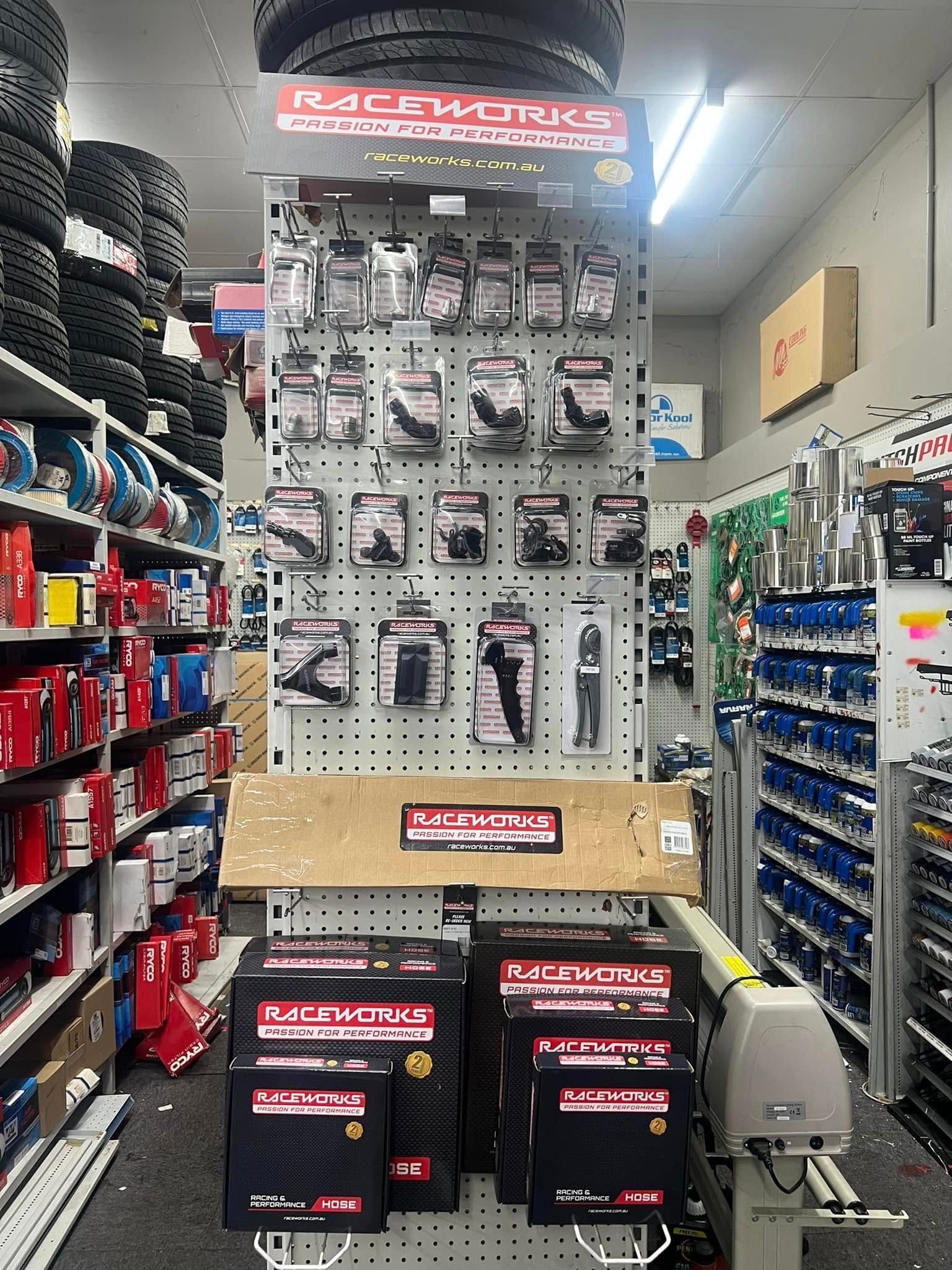 Hardware Store Aisle With Pegboard Display of Tools and Boxed Products — Autopro Taree in Wingham, NSW