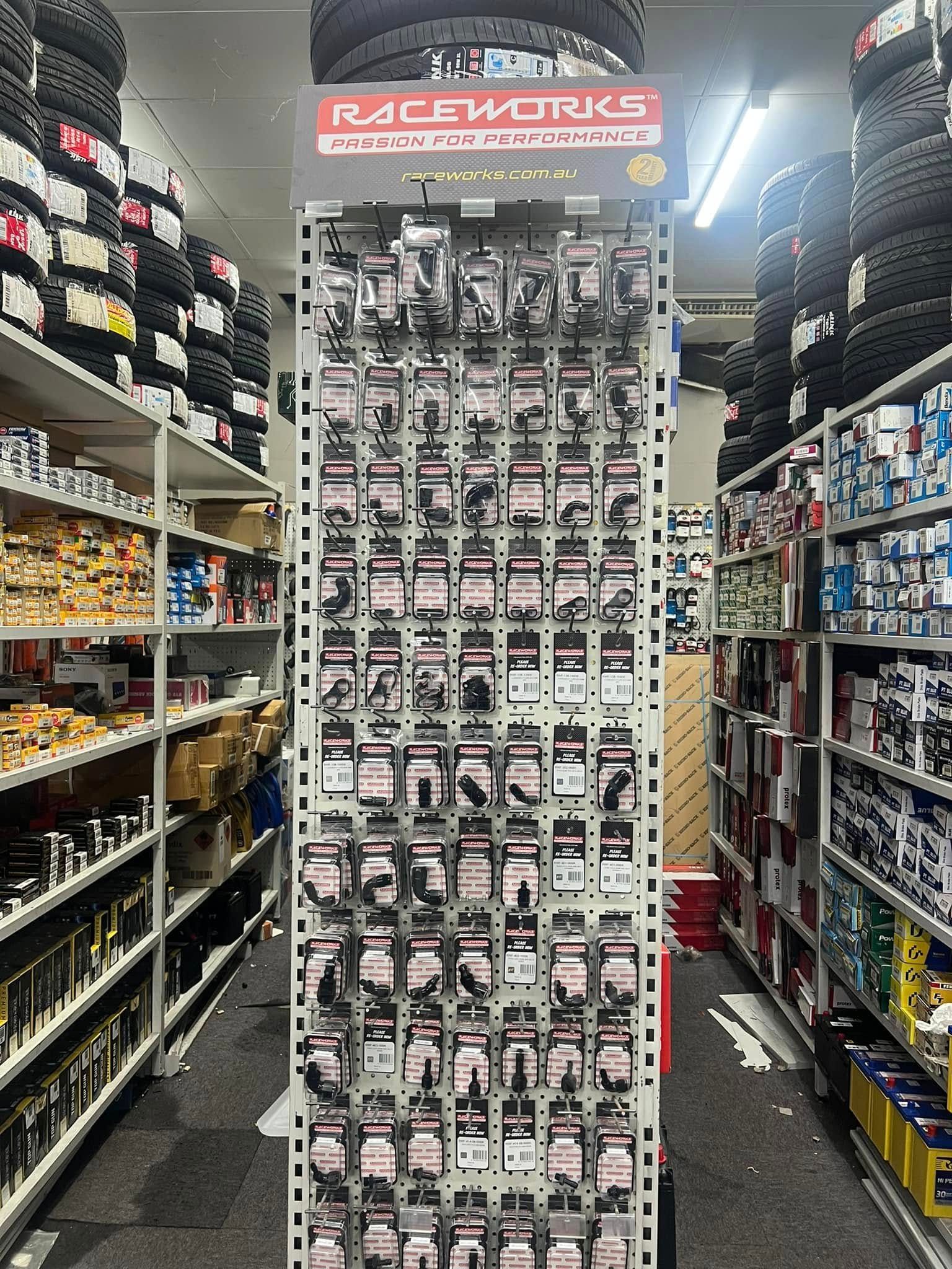 Tall Display Rack of Car Parts and Accessories — Autopro Taree in Taree, NSW