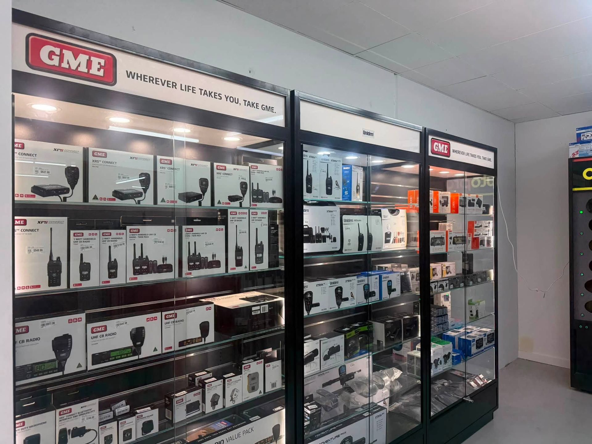 Retail Store Shelves Stocked With Boxed Electronics and Accessories — Autopro Taree in Taree, NSW