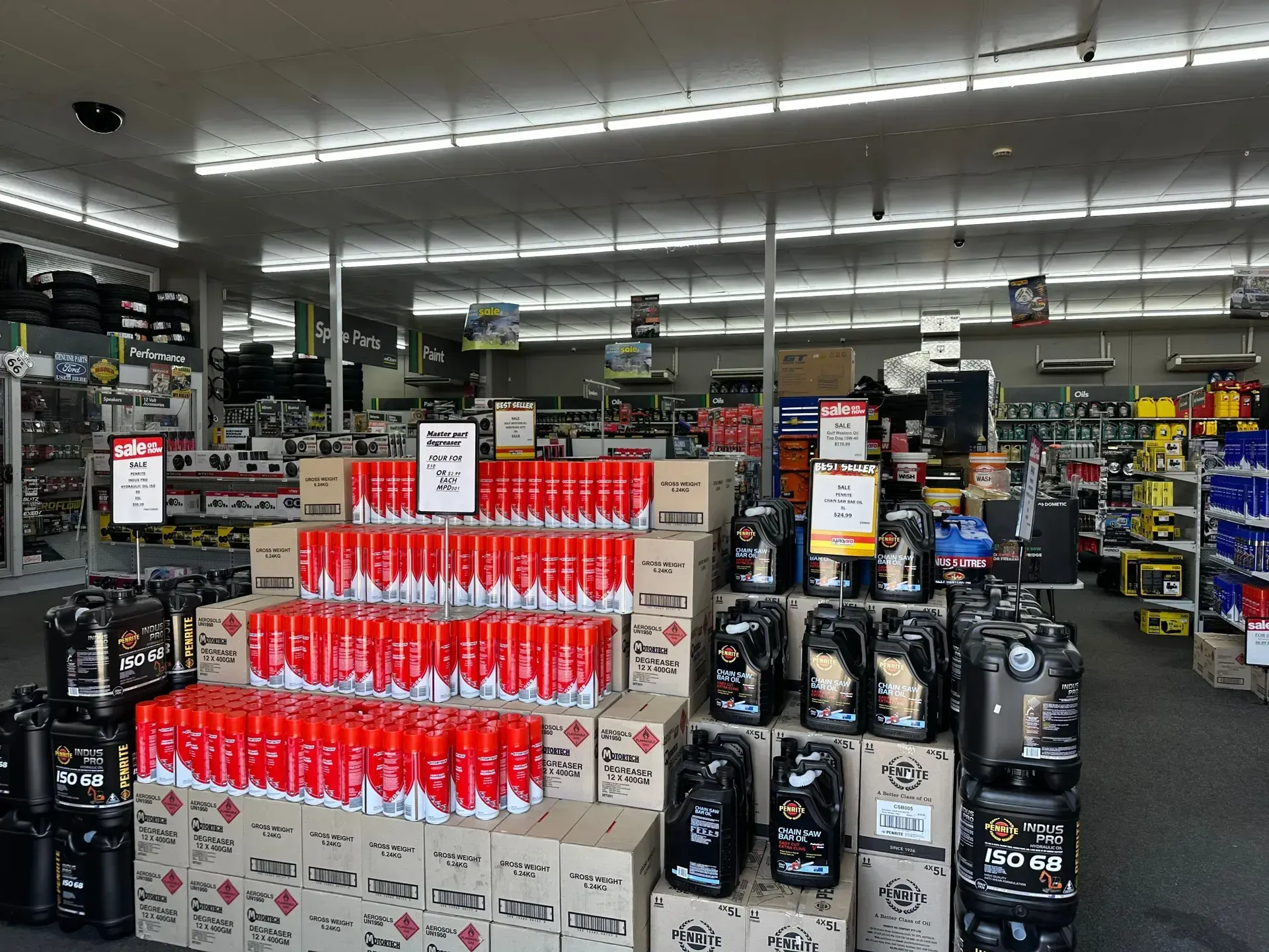 Store Aisle With Stacked Sale Displays and Product Boxes — Autopro Taree in Taree, NSW