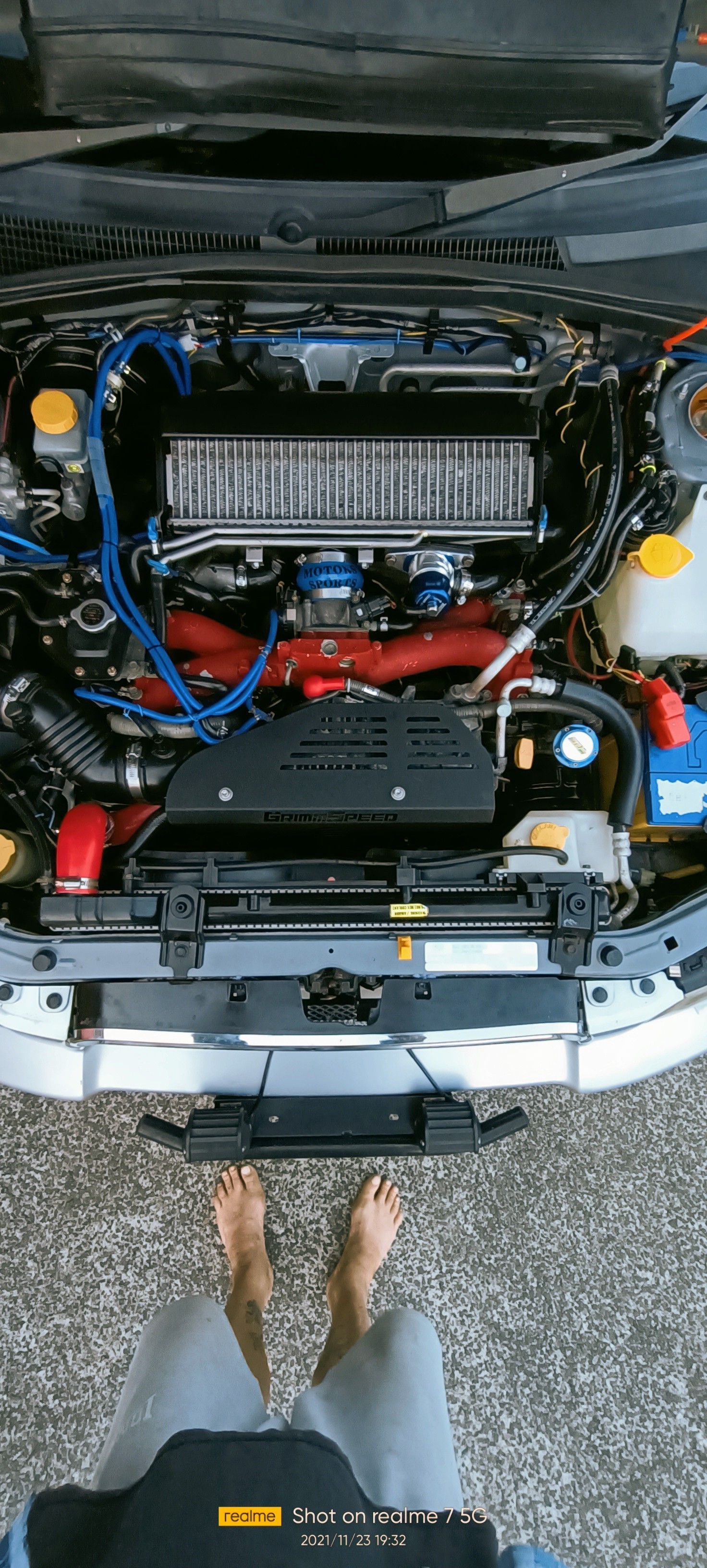 Open Car Hood Showing a Modified Engine Bay — Autopro Taree in Taree, NSW
