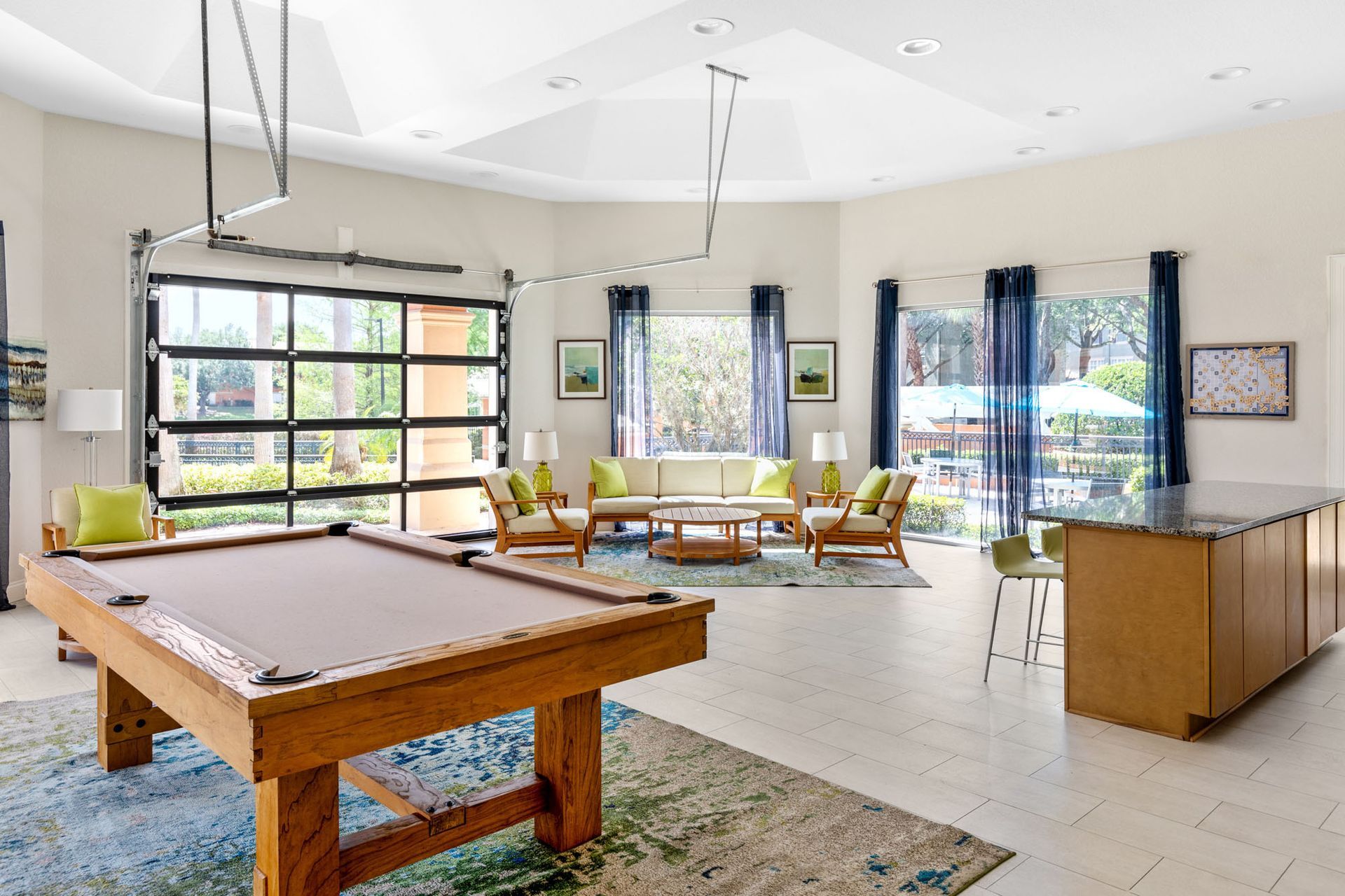 Clubhouse with pool table at The Debra in Orlando, FL.