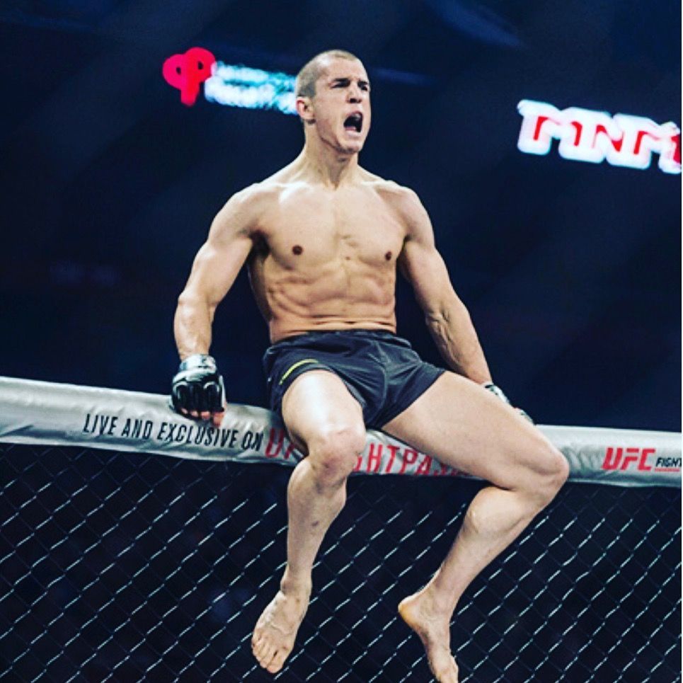 Collin Baikie celebrates after winning in the UFC octagon in Canada.