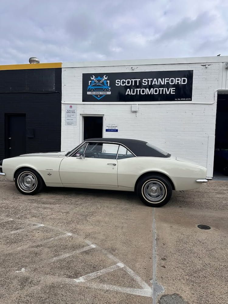 White Classic Camaro Parked in Front of a Shop — Scott Stanford Automotive in Nowra, NSW