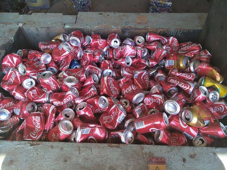 A Large Pile of Crushed Coca Cola Cans — Hastings Scrap Metal Recyclers in Wauchope, NSW