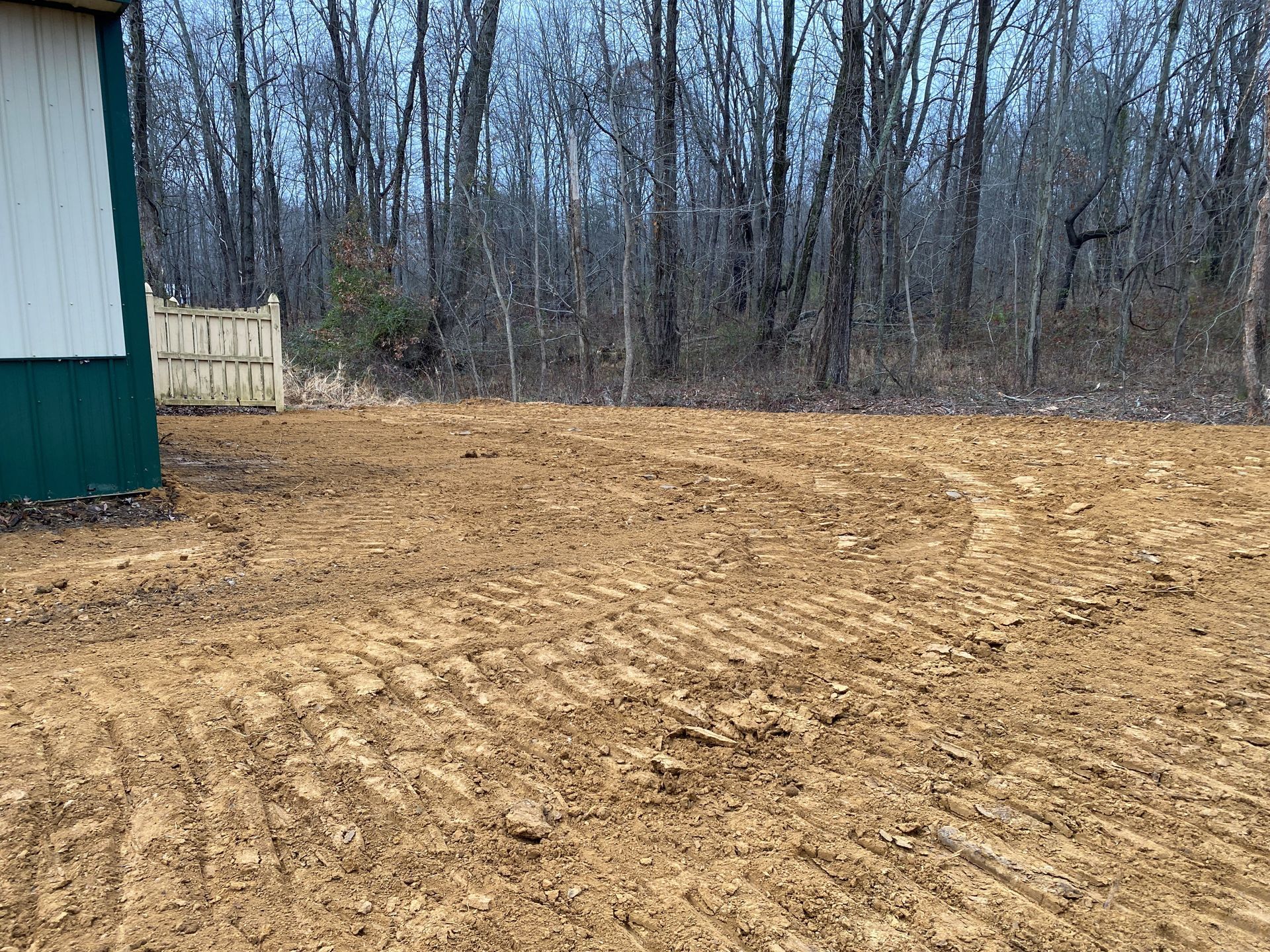 Cleared Land With Tire Tracks