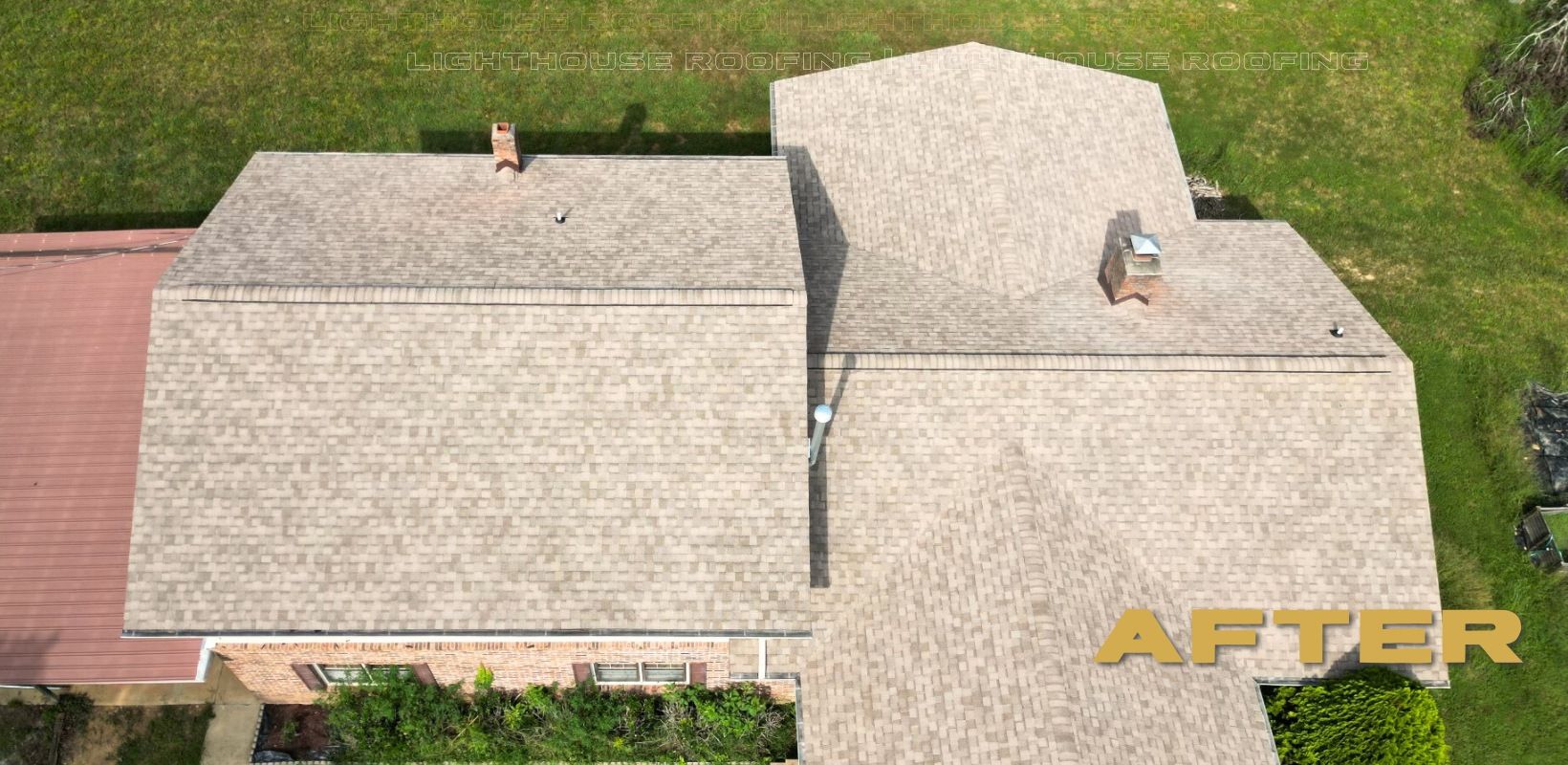 An aerial view of a house with a new roof.
