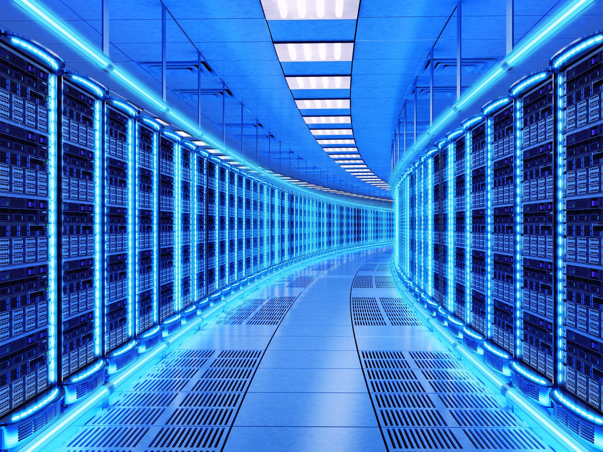Blue-lit data center aisle with rows of server racks on both sides