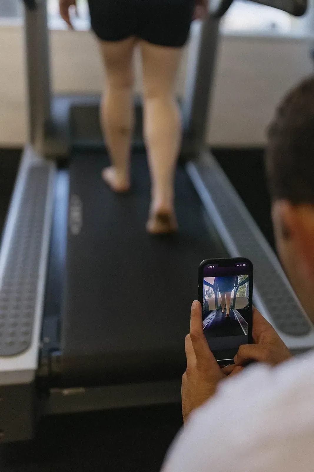 Person Filming Someone Walking on A Treadmill at A Gym — Lord Street Podiatry in Port Macquarie, NSW