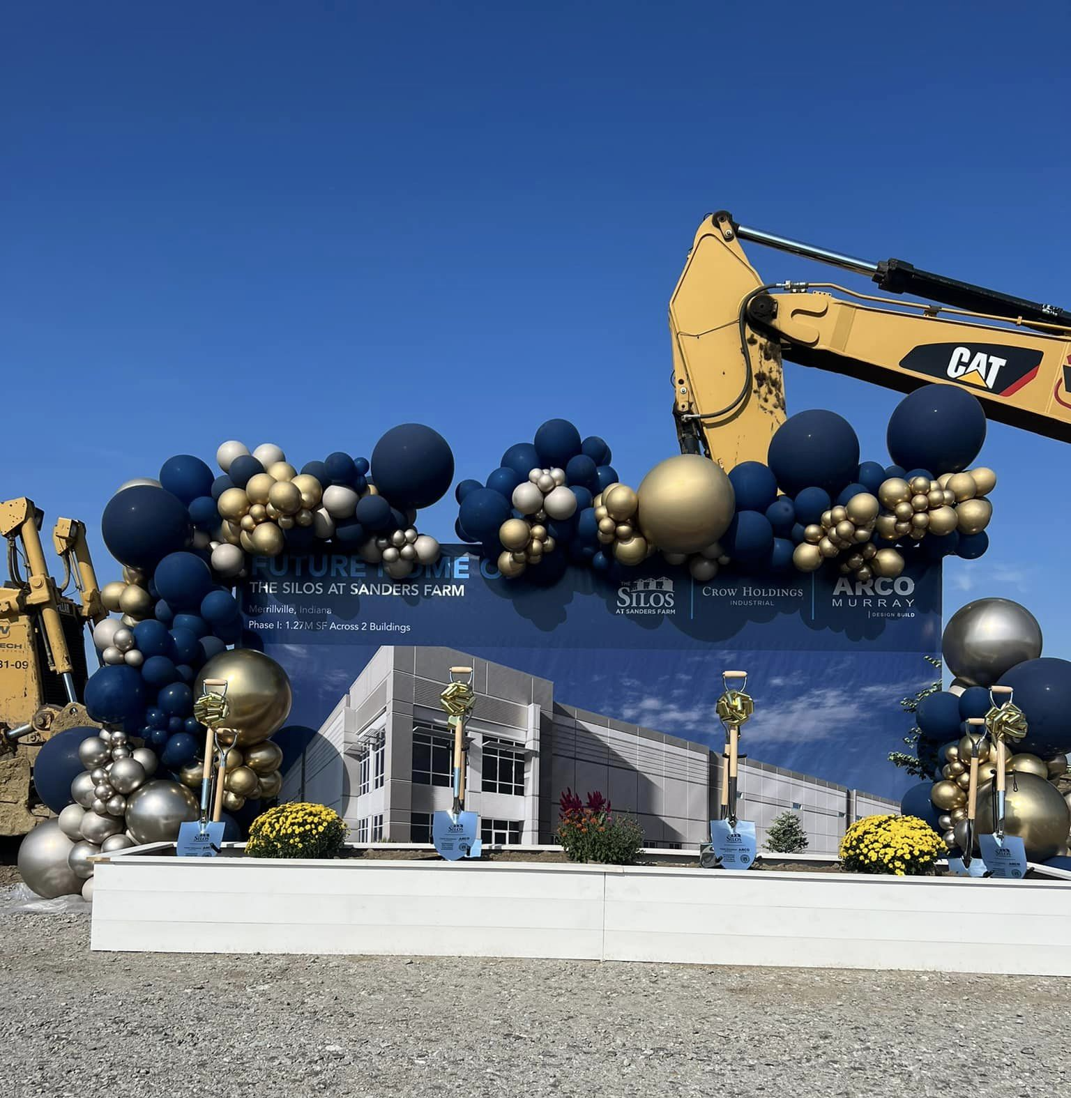 Grand Luxe Outdoor Organic Balloon Decor for a groundbreaking at new 