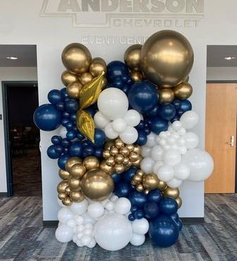 Eye-catching balloon wall inside Mike Anderson Chevrolet, featuring custom branded colors for a bold and professional event display, perfect for grand openings, promotions, and corporate decor.
