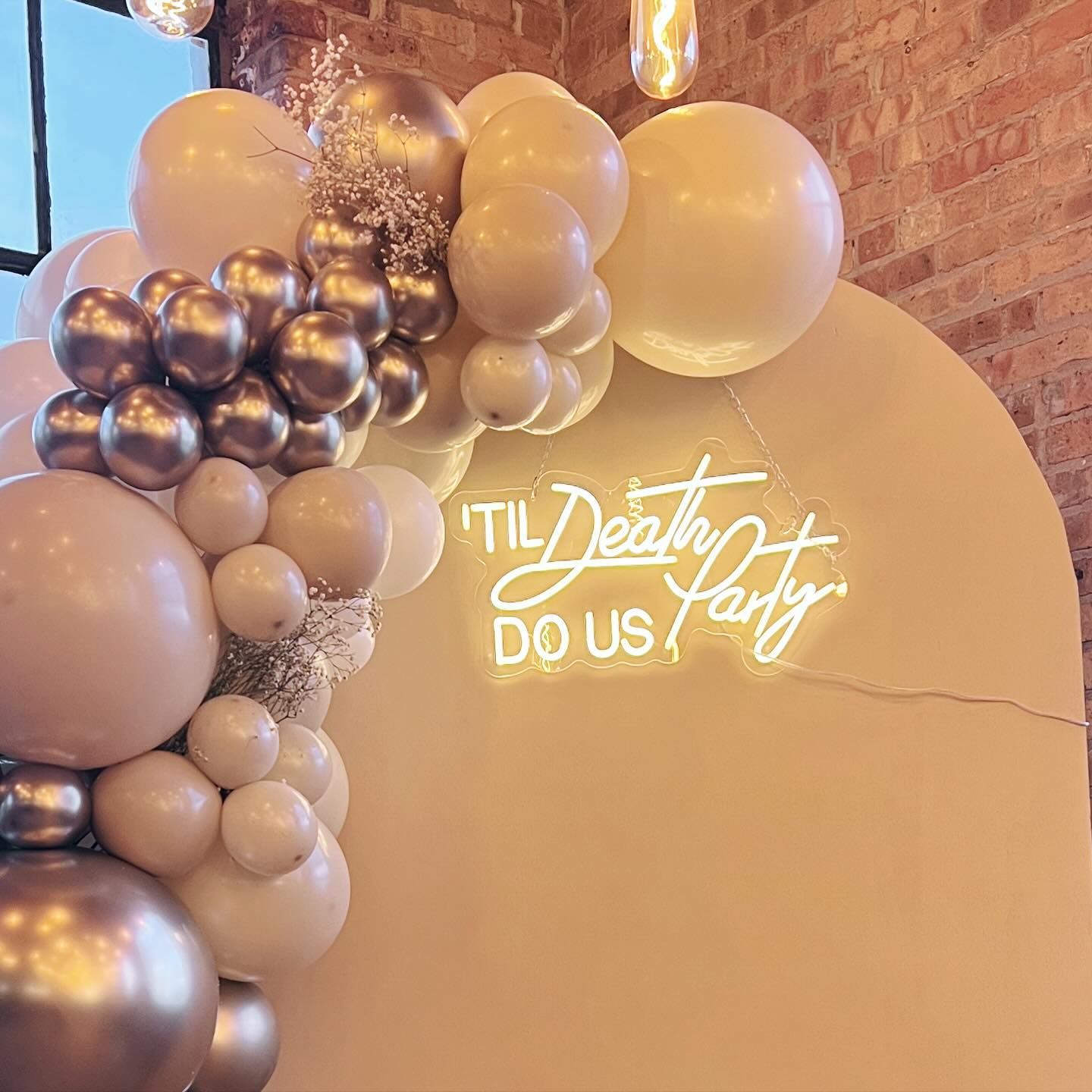 'Til Death Do Us Party' wedding reception balloon decor in Rensselaer, Indiana, featuring a grand deluxe luxury organic balloon garland. A bold and elegant statement piece perfect for celebrating in style.