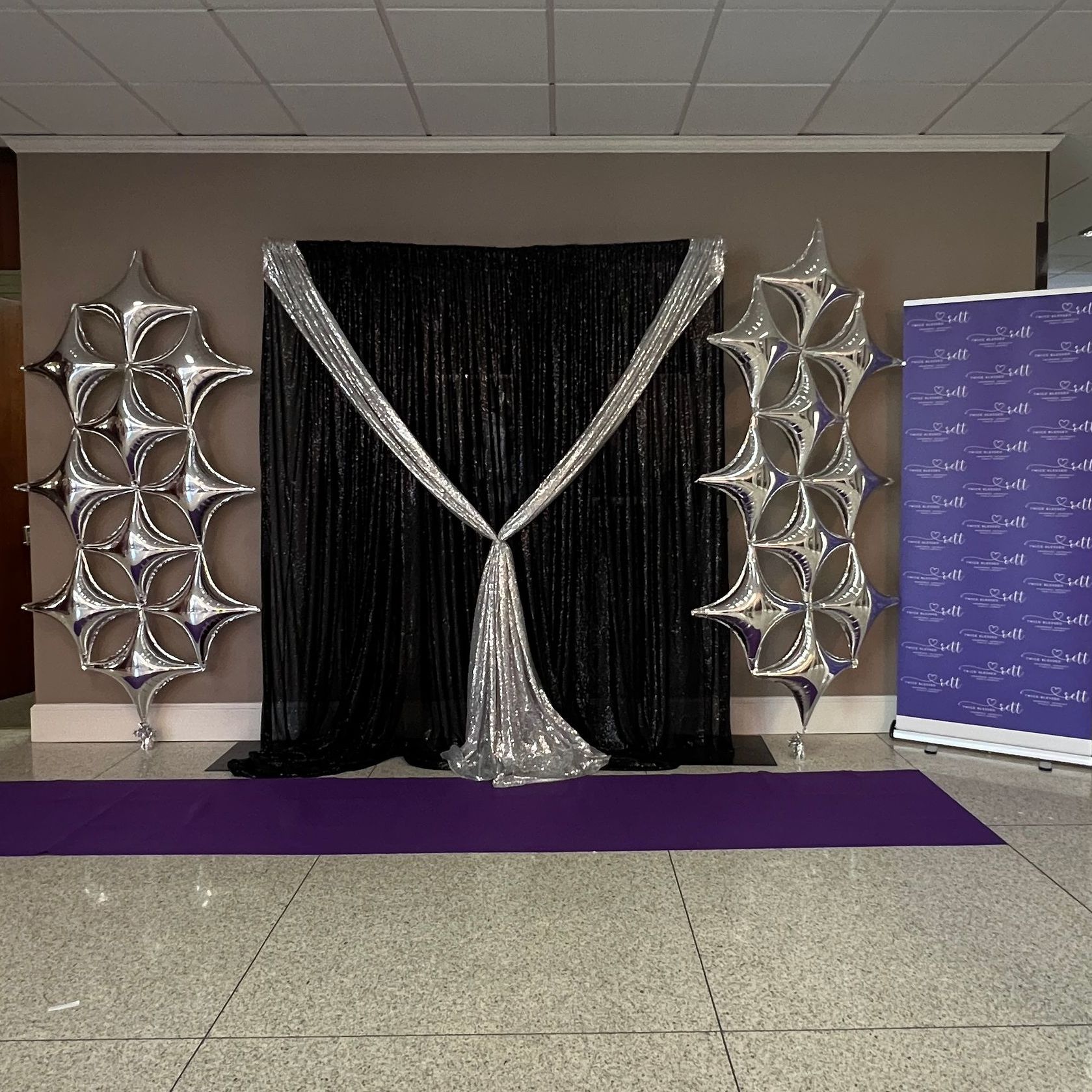 Backdrop for Mom Prom with Foi bouquets 