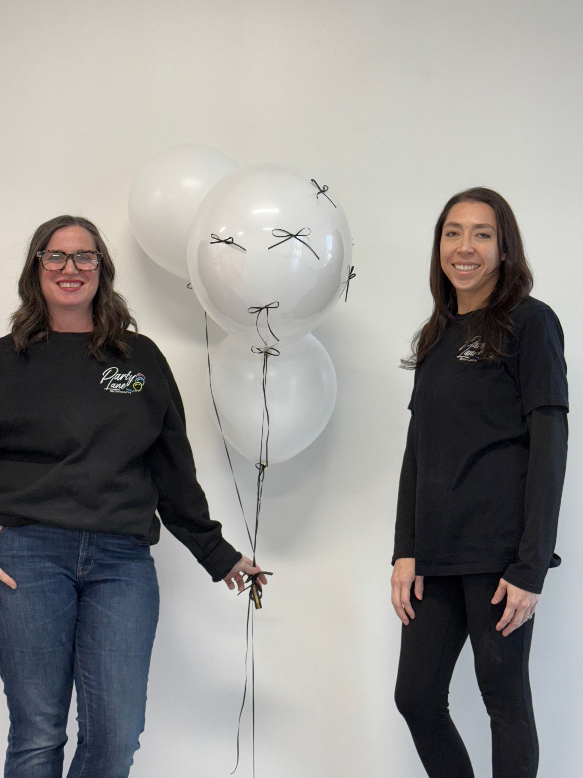 Balloons and bows the perfect combination. Alissa and Shanna at the Party Lane retail balloon shop