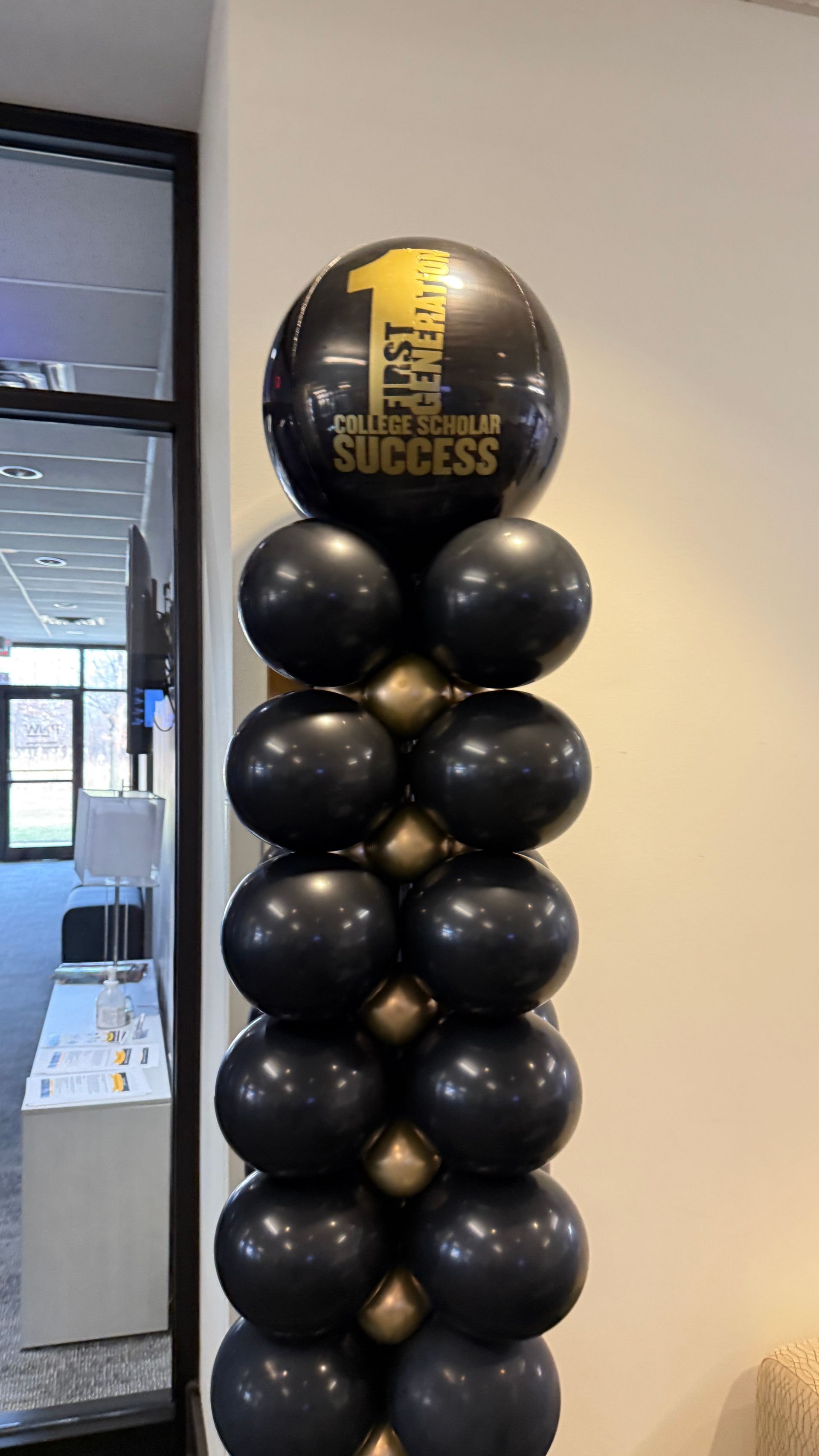 black and gold square pack column with a custom printed balloon topper in northwest indiana 