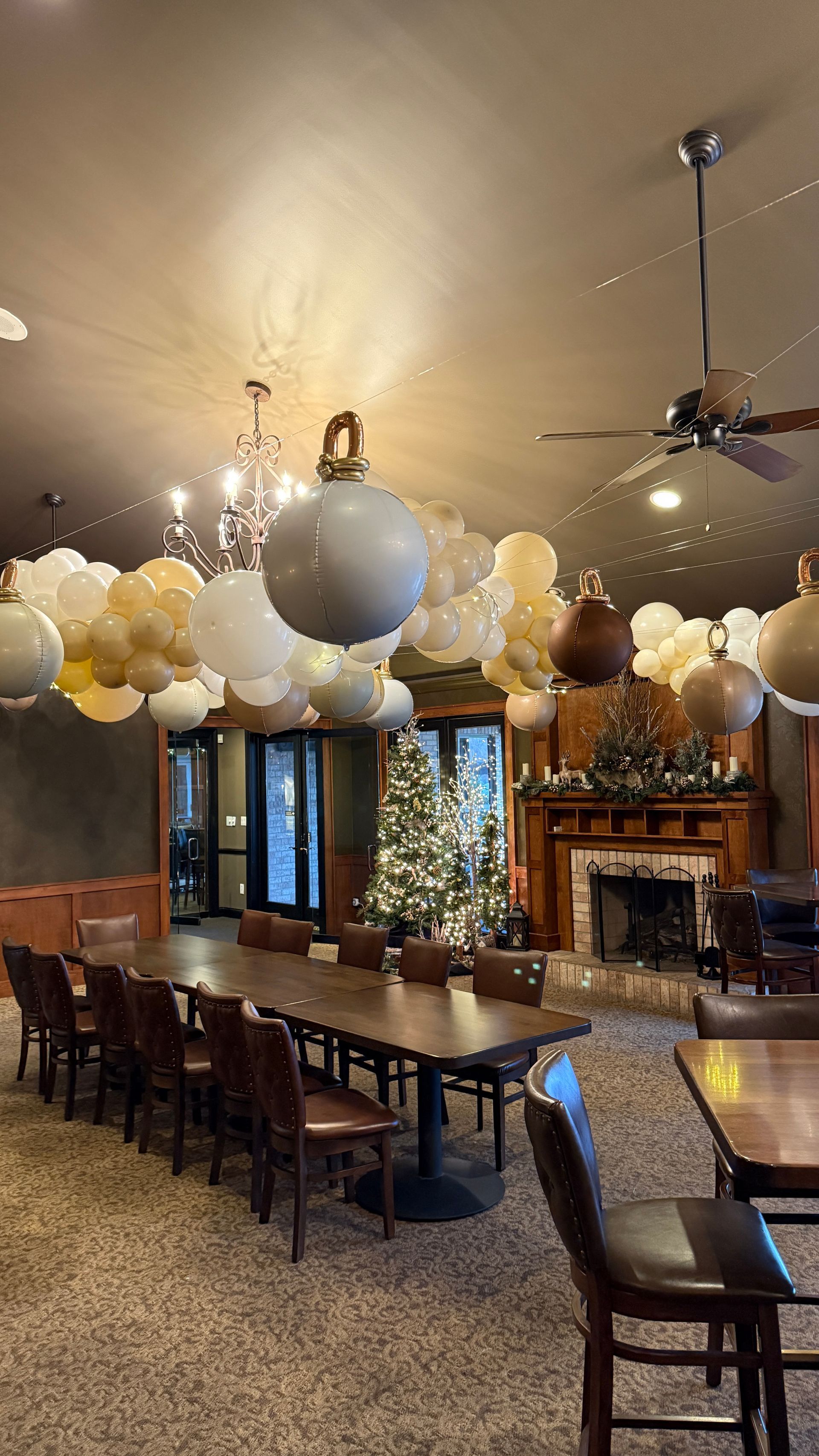 Our Thrown prop, shimmer wall and shimmer curtain back drop, with winter wonderland themed balloon garland with snowflake embellishments 