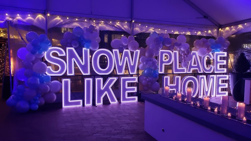 'Snow Place Like Home' LED marquee display, perfect for winter-themed events, holiday parties, and seasonal home decor.