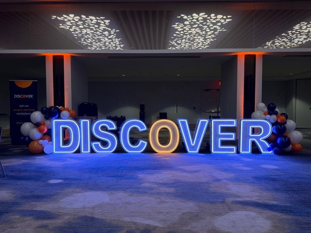 Custom 'Discover' LED marquee display for Discover Card, creating a dynamic and professional event decor for brand activations, corporate events, and promotions.