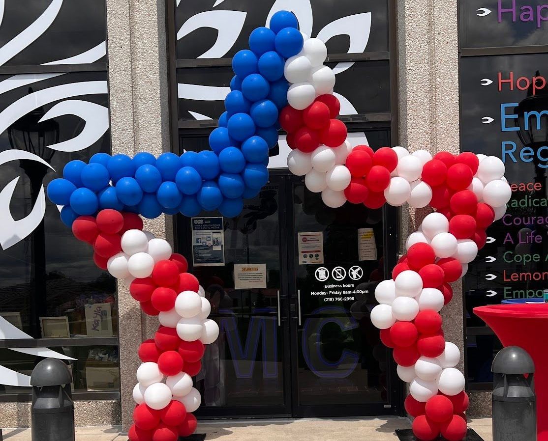 Patriotic Star Shaped Arch for a summer Grand Opening 
