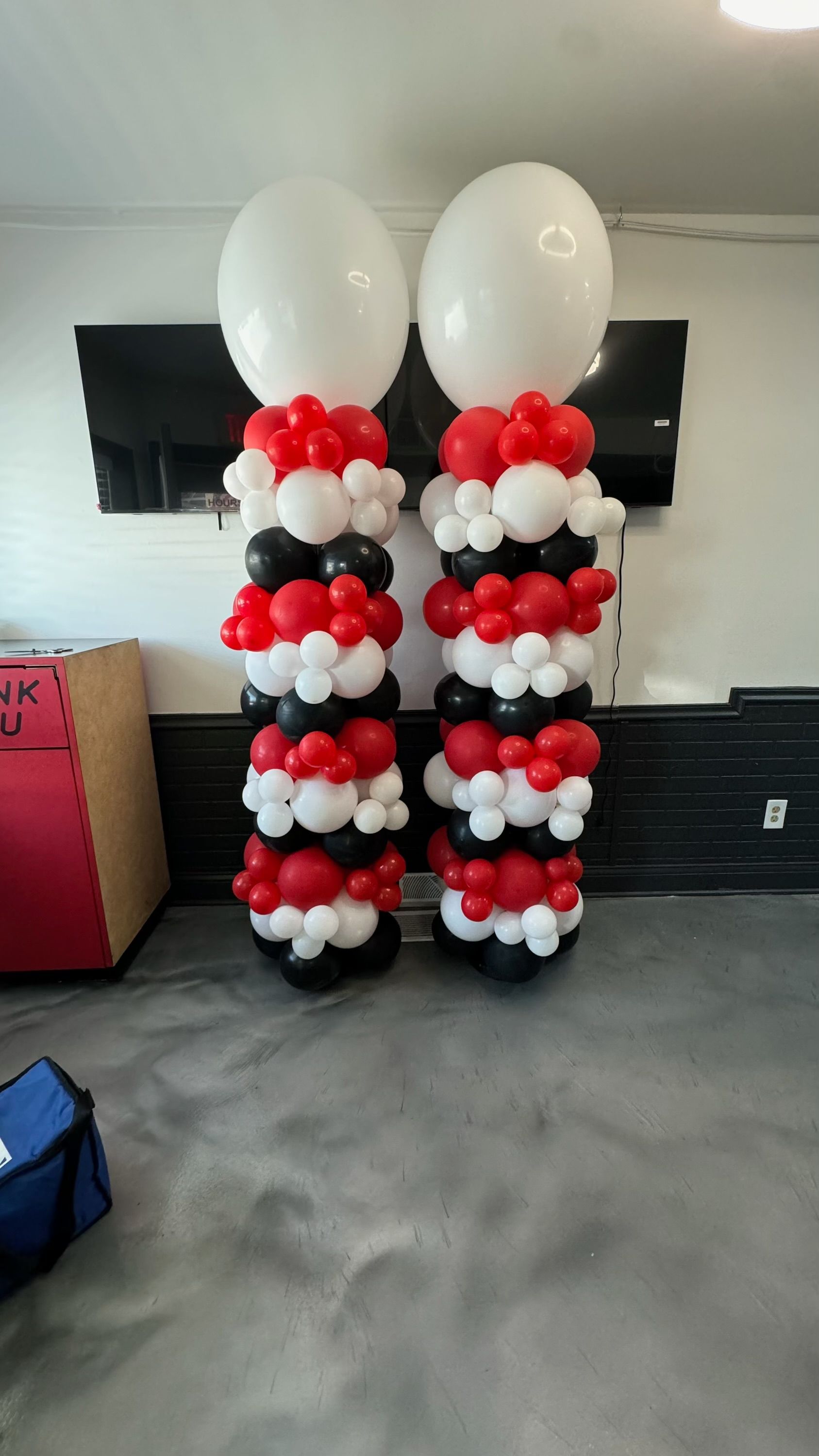 Baby organic balloon columns for a grand opening 