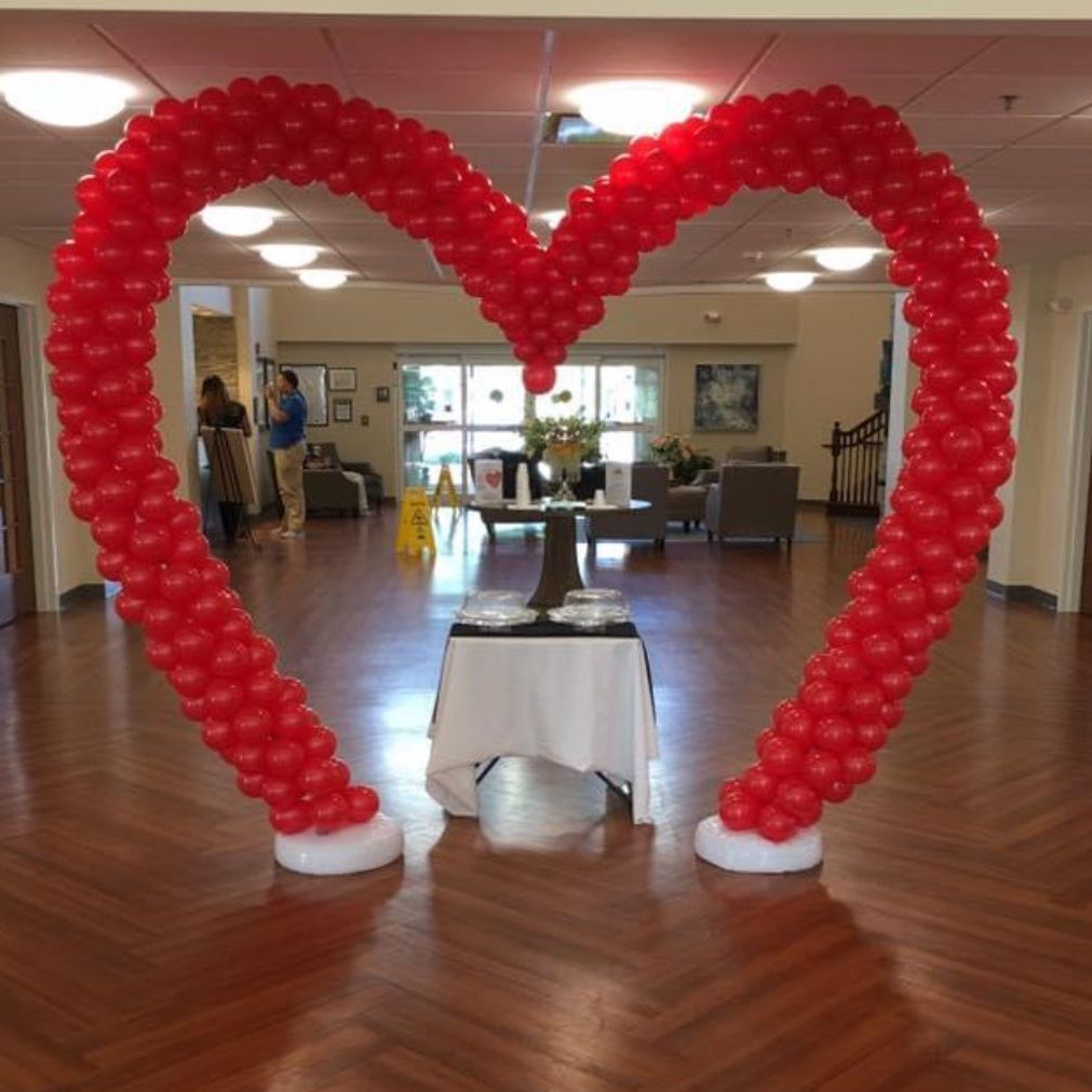 fall in love with your business with this heart arch