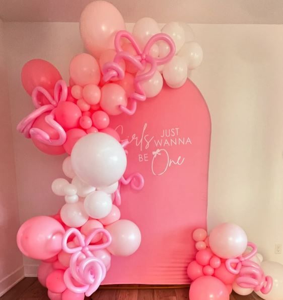 twisted balloon bows in a garland or on a helium balloon as an accent