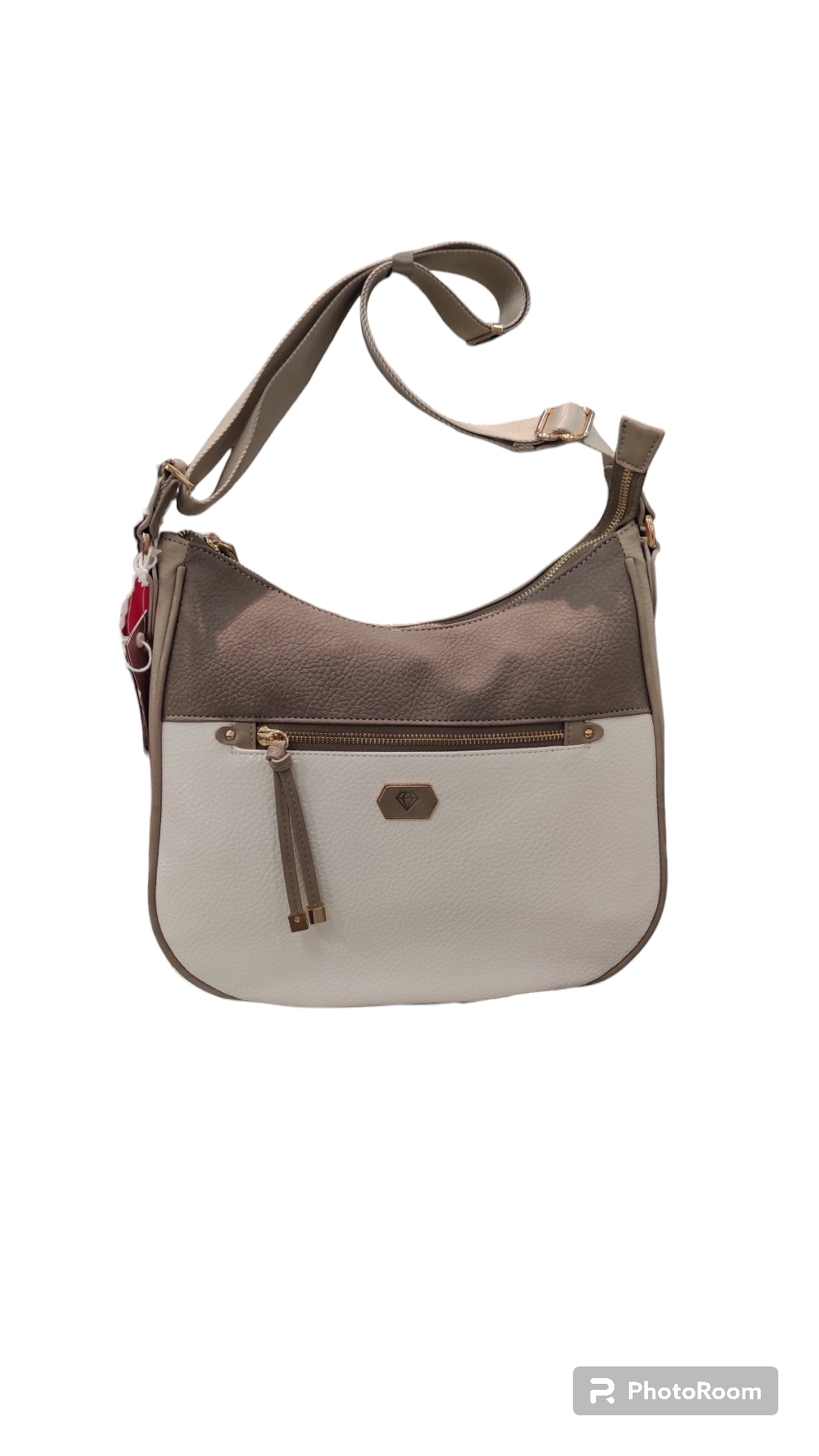 Borsa a tracolla color cuoio e bianco sporco con tracolla lunga, tasca frontale con cerniera e parte superiore testurizzata.