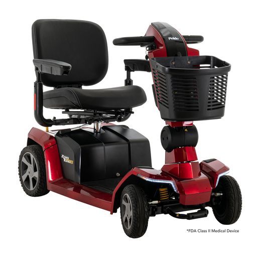 A red and black mobility scooter with a basket on the front.