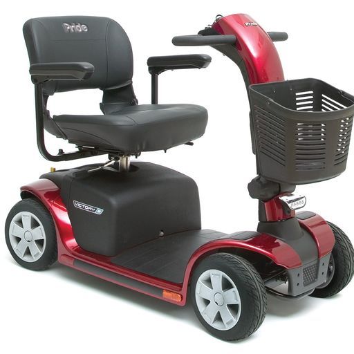 A red mobility scooter with a basket attached to it