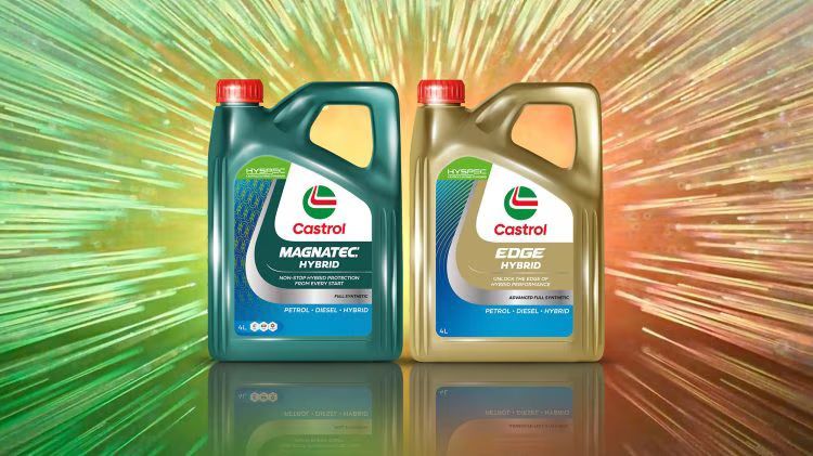 Two Bottles of Castrol Engine Oil Are Sitting Next to Each Other — Wades Distributors In Garbutt, QLD
