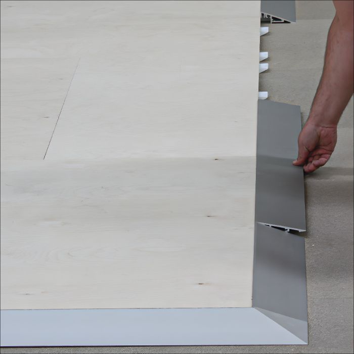 Aluminium sloping perimeter on an exhibition floor