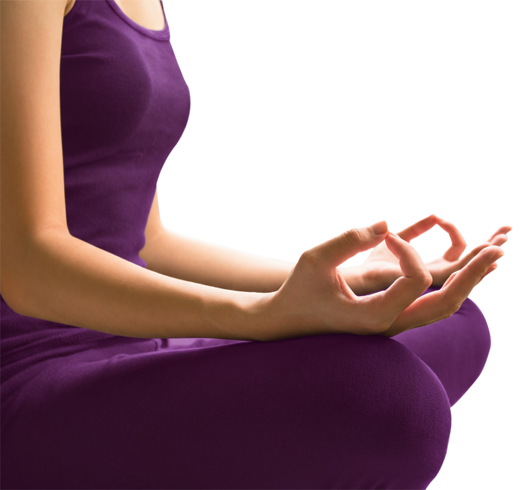 Woman in purple activewear meditating, hands in mudra pose.