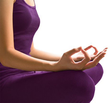 Woman in purple activewear meditating, hands in mudra pose.
