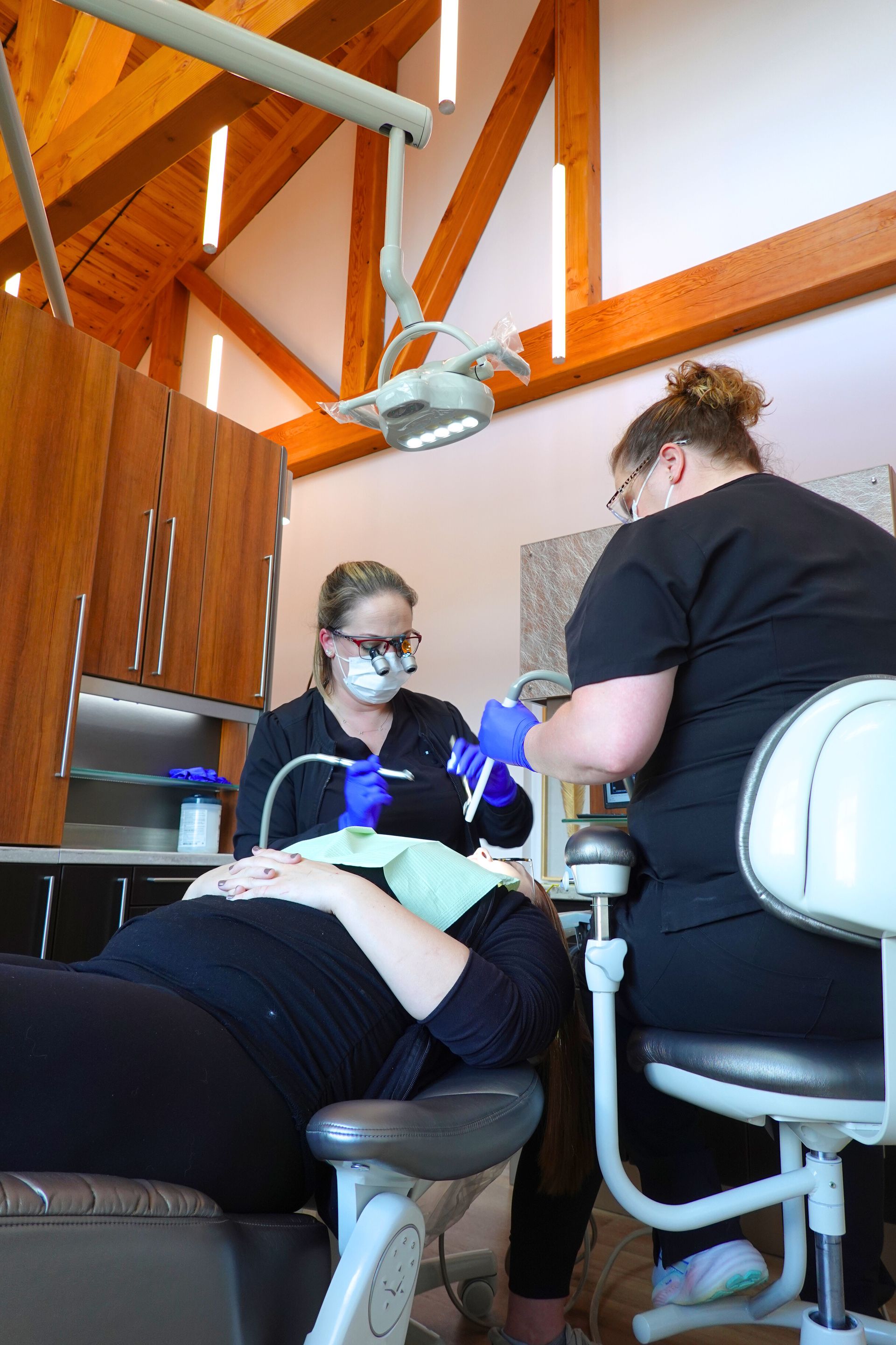Dr. Deidre placing a filling