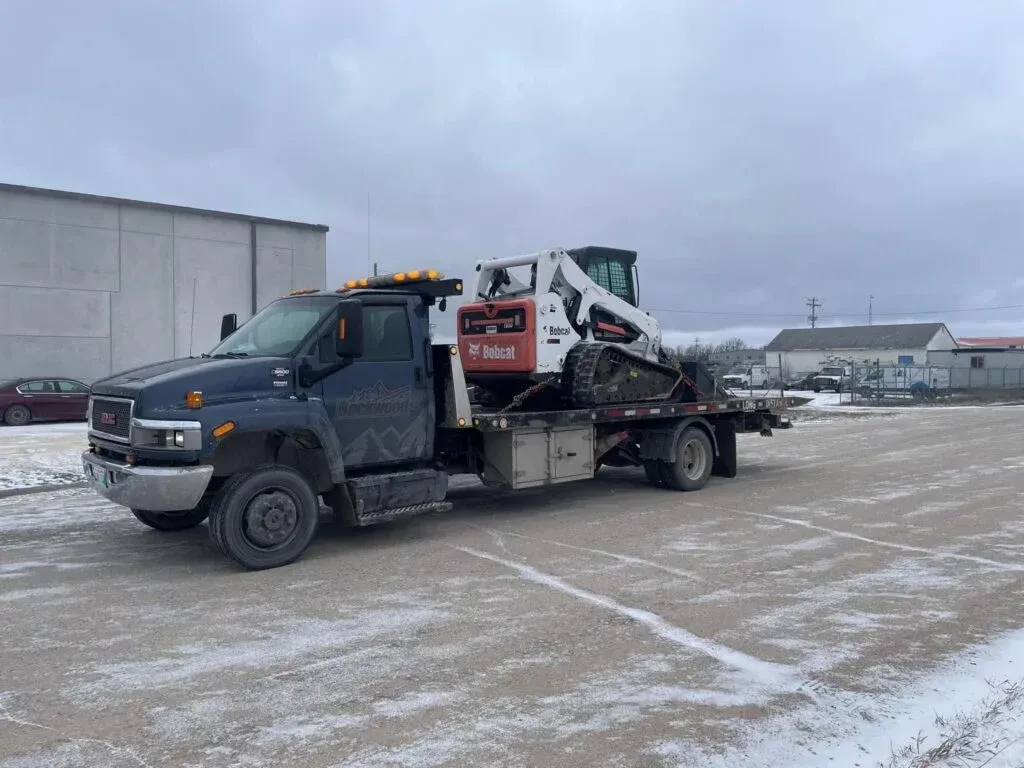 equipment hauling manitoba