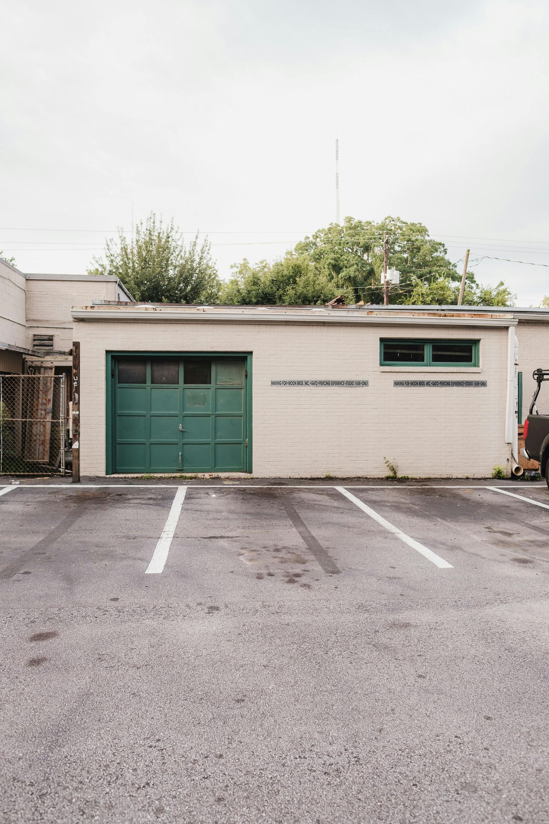 A parking lot with a yellow line on the side of the road.